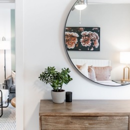 a dresser and a mirror
