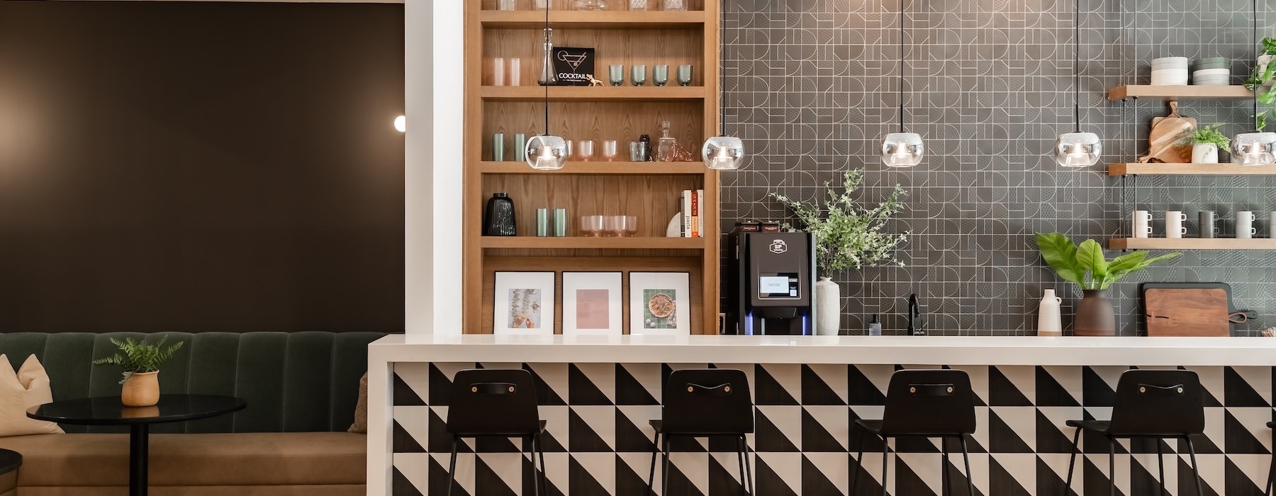 a community kitchen with a coffee bar
