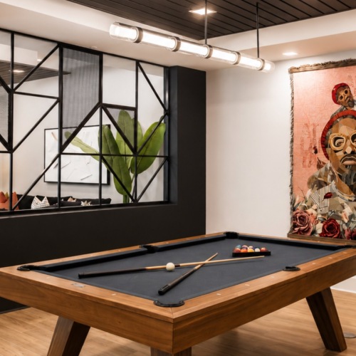 a pool table in a clubroom