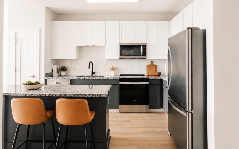 a kitchen with white cabinets